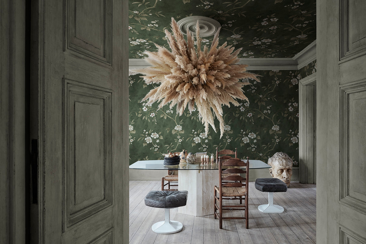 Poetic Flora wall mural by Rebel Walls in Green, styled room
