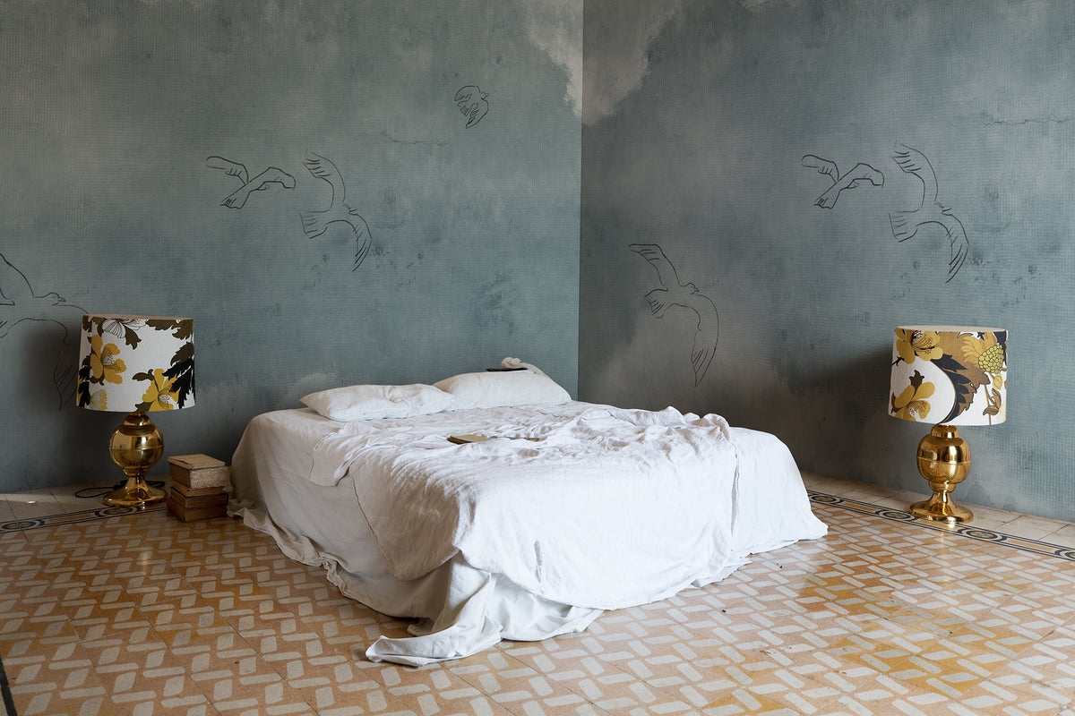 Wings Over Horizon wall mural by Rebel Walls in Blue, styled room
