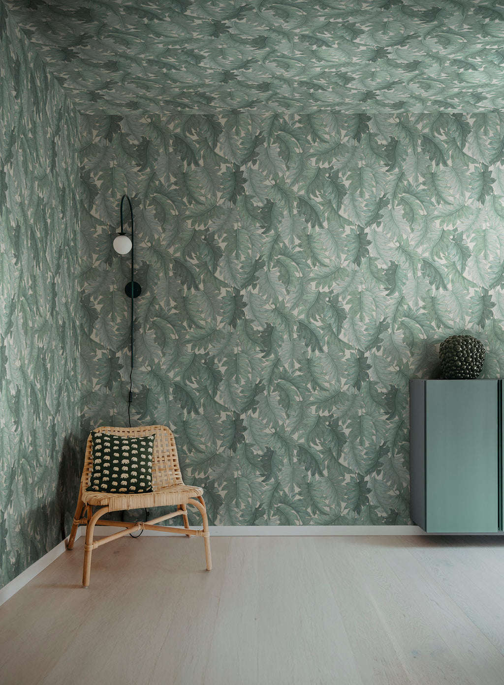Swirling Fern wall mural by Rebel Walls in Teal, styled room