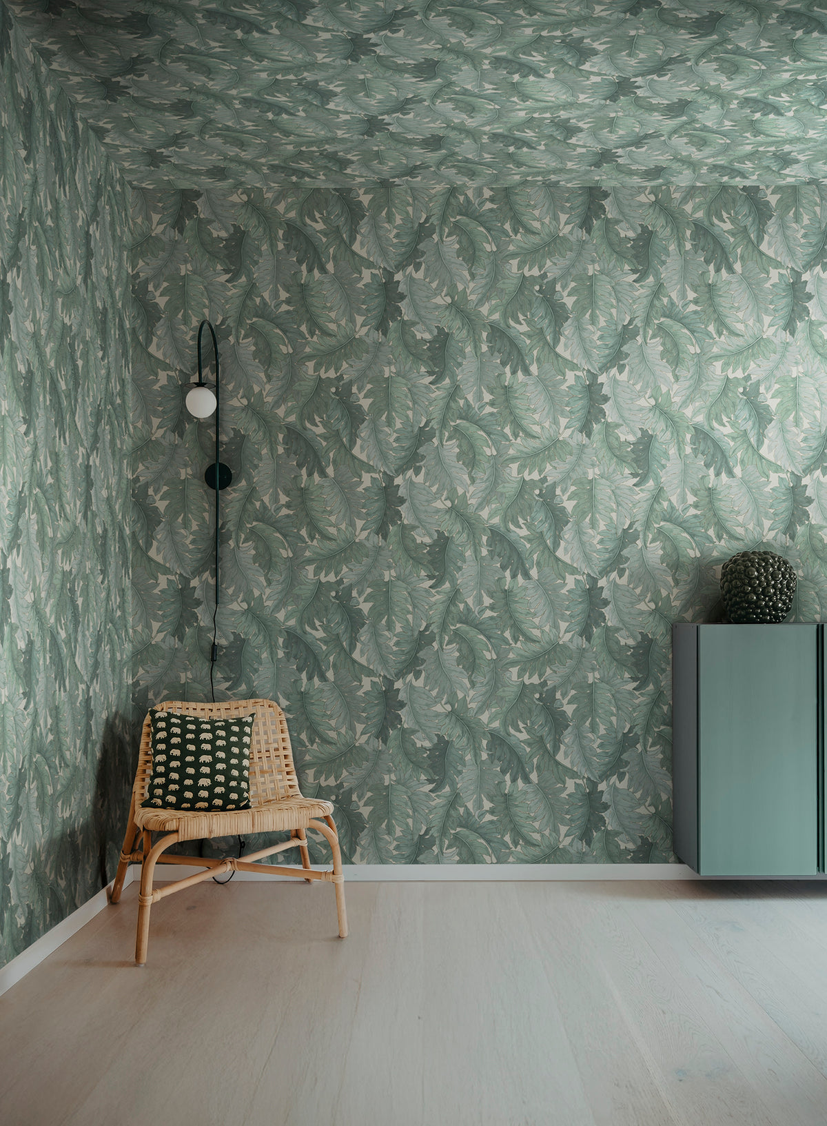 Swirling Fern wall mural by Rebel Walls in Teal, styled room