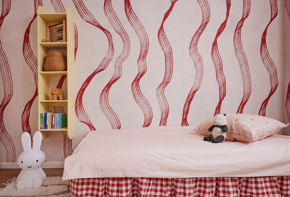 Ribbon Stripe wall mural by Rebel Walls in Red, styled room