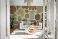 Watercolor Shapes wall mural by Rebel Walls in Brown, styled room