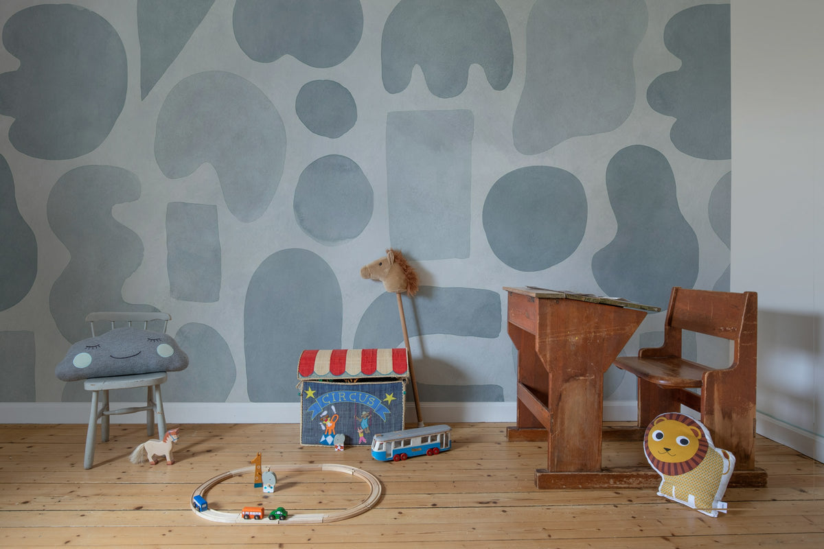 Watercolor Shapes wall mural by Rebel Walls in Blue, styled room
