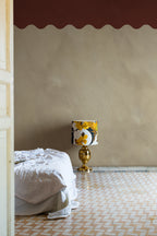 Wave Border wall mural by Rebel Walls in Brown, styled room
