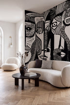 Artistic Faces wall mural by Rebel Walls in Black, styled room