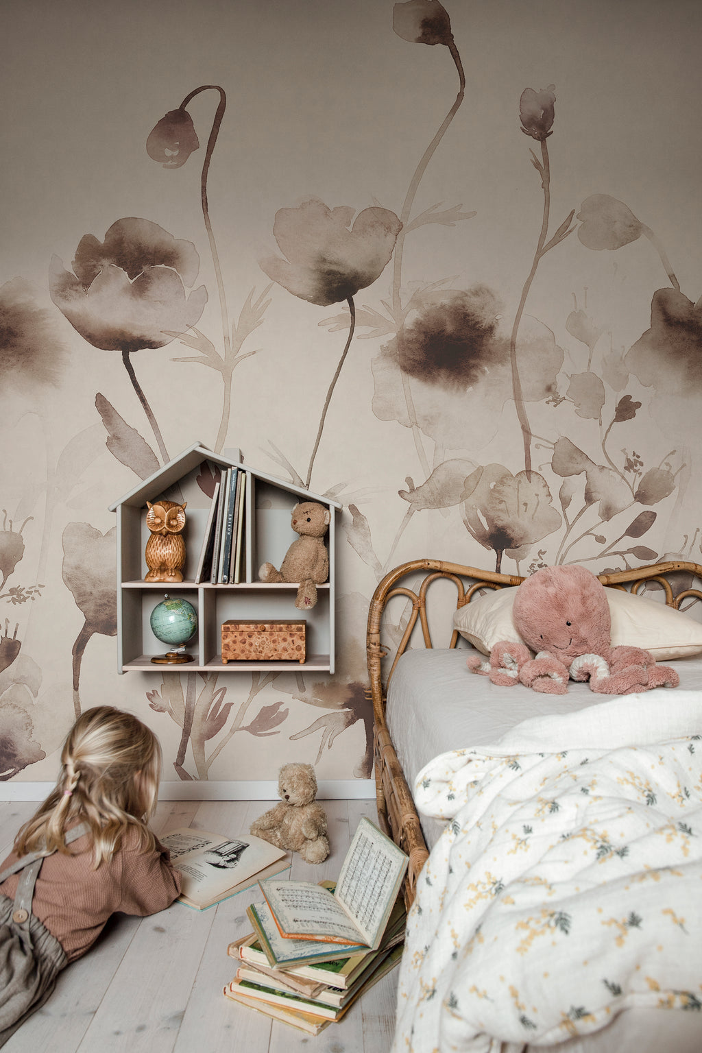 Morängen Floral wall mural by Sandberg in sepia, soft brown watercolour poppies in a childs bedroom with a rattan bed