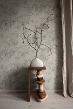 Jon wallpaper by Sandberg in Olive Green, styled on an interior wall