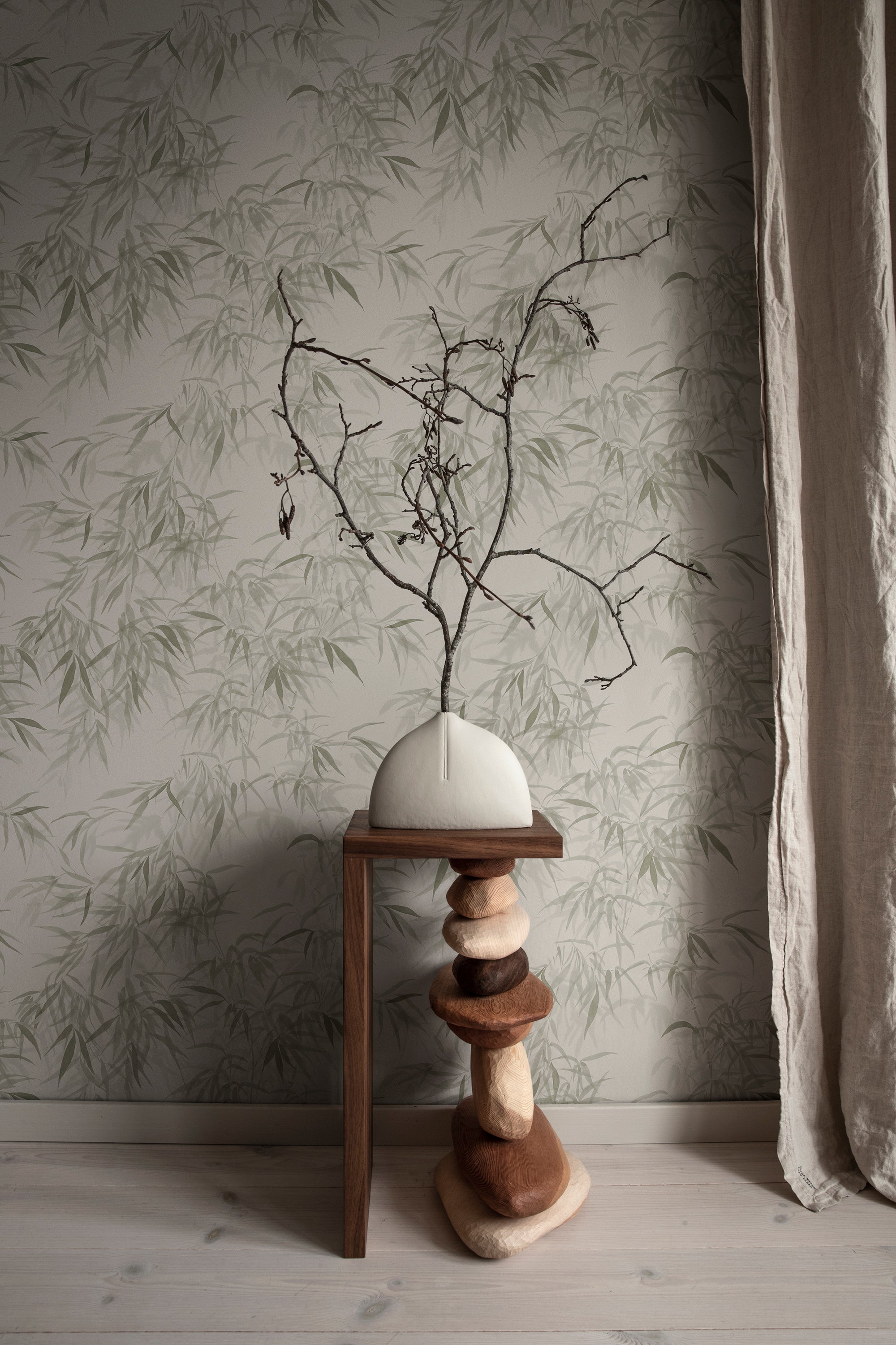 Jon wallpaper by Sandberg in Olive Green, styled on an interior wall