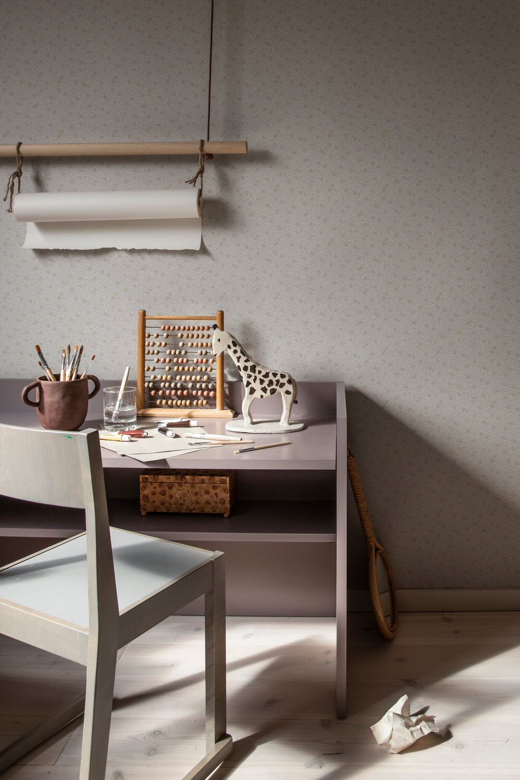 Stella wallpaper by Sandberg in Sandstone, styled on an interior wall