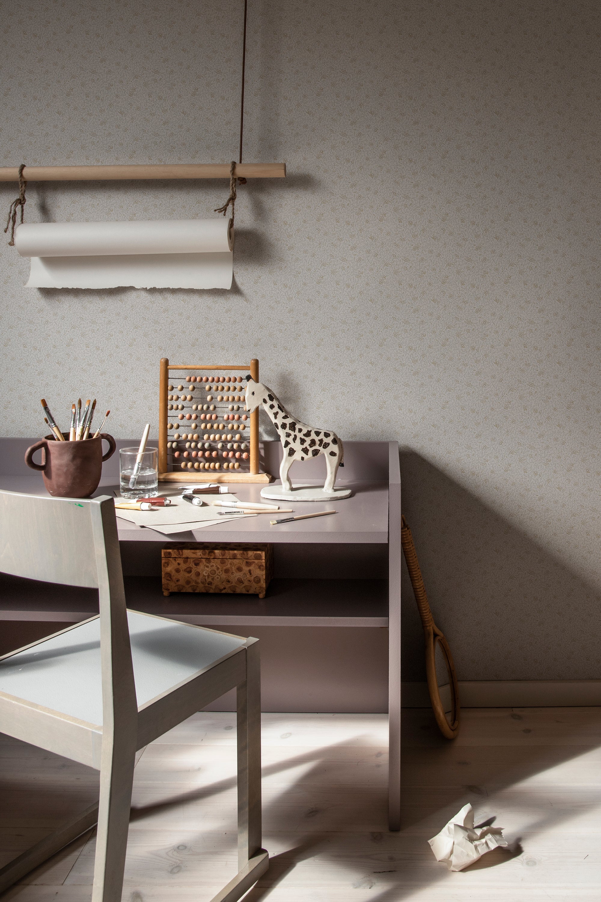 Stella wallpaper by Sandberg in Sandstone, styled on an interior wall