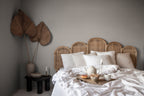 Stella wallpaper by Sandberg in Sage Green, styled on an interior wall
