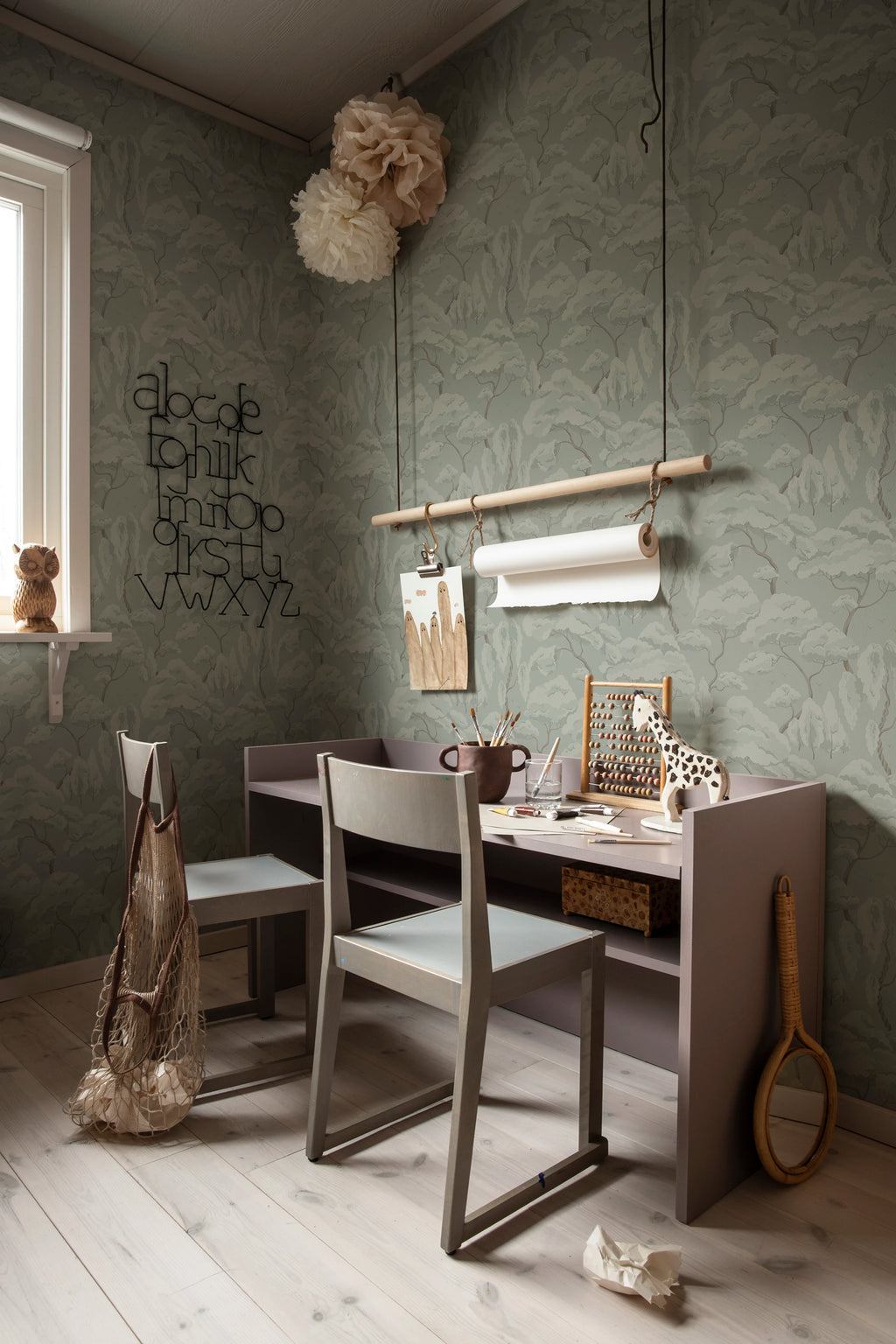 Kristoffer wallpaper by Sandberg – Sage Green colourway, styled on an interior wall