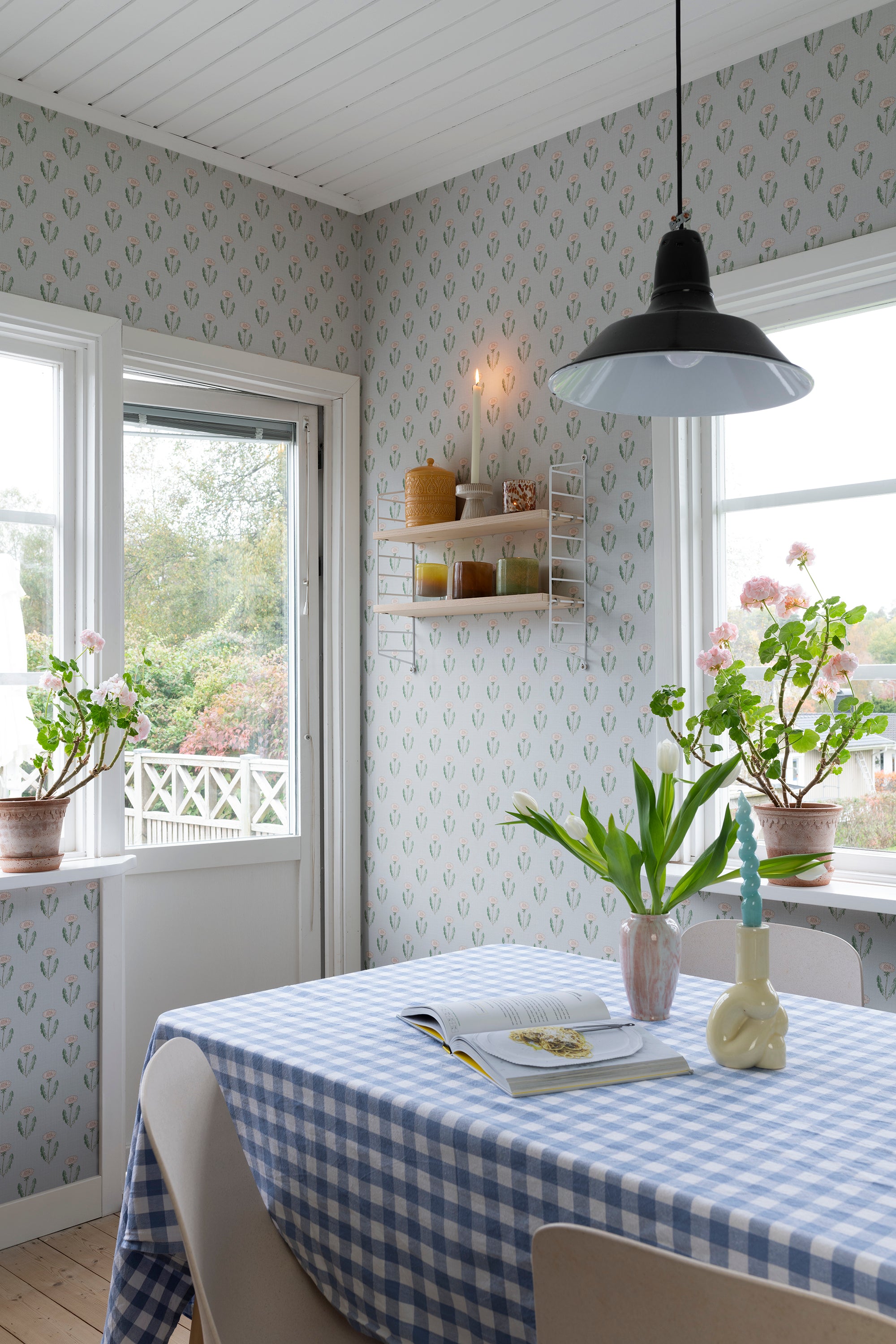 Maskrosen wallpaper by Sandberg in Soft Blue, styled on an interior wall