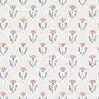 Maskrosen wallpaper by Sandberg, flat swatch of stylised dandelion motifs in blush pink and dusty blue on a cream ground