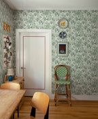 Kersti wallpaper by Sandberg in Spring Green, styled on an interior wall