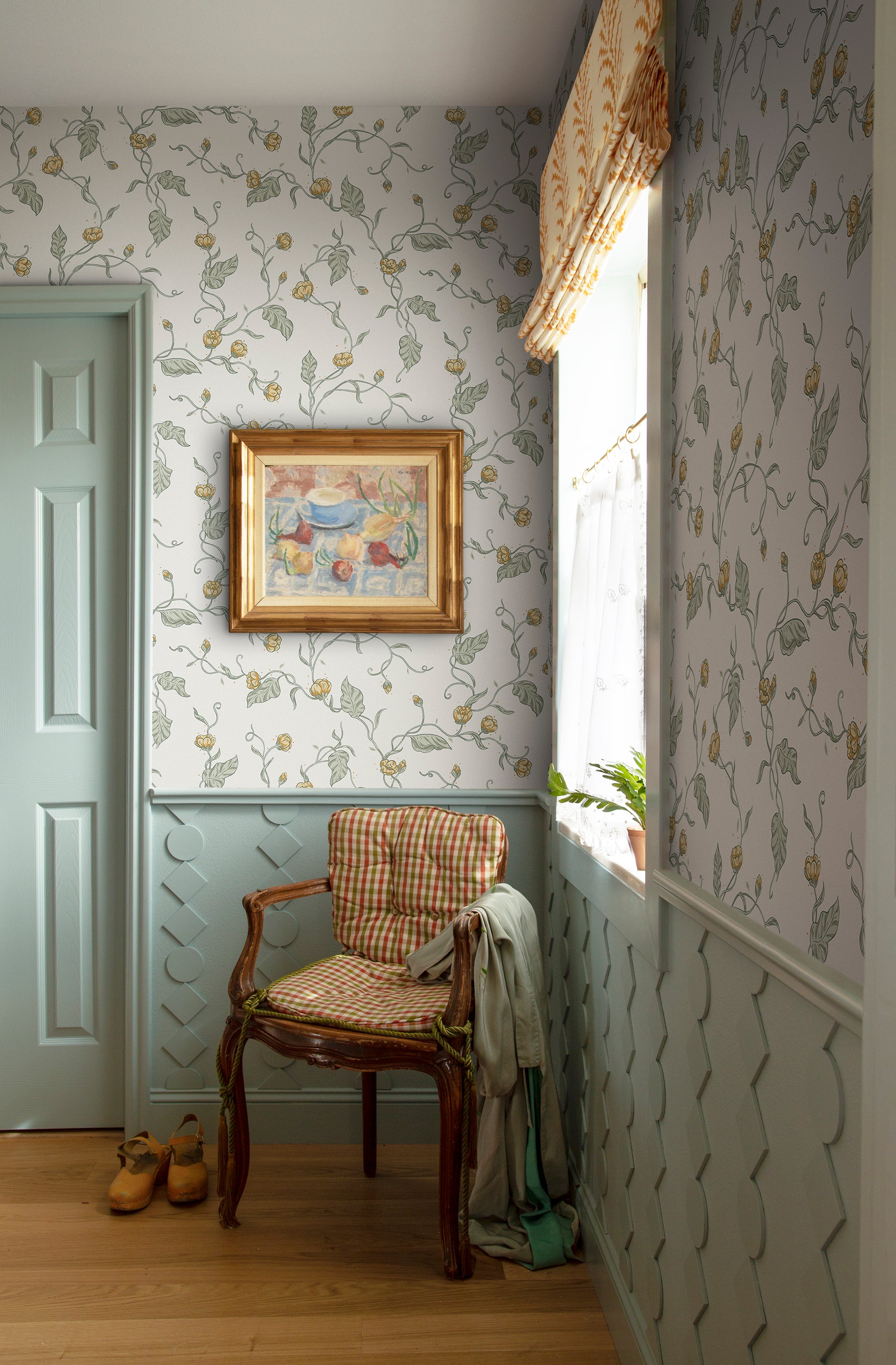 Elmire wallpaper by Sandberg in Spring Green, styled on an interior wall