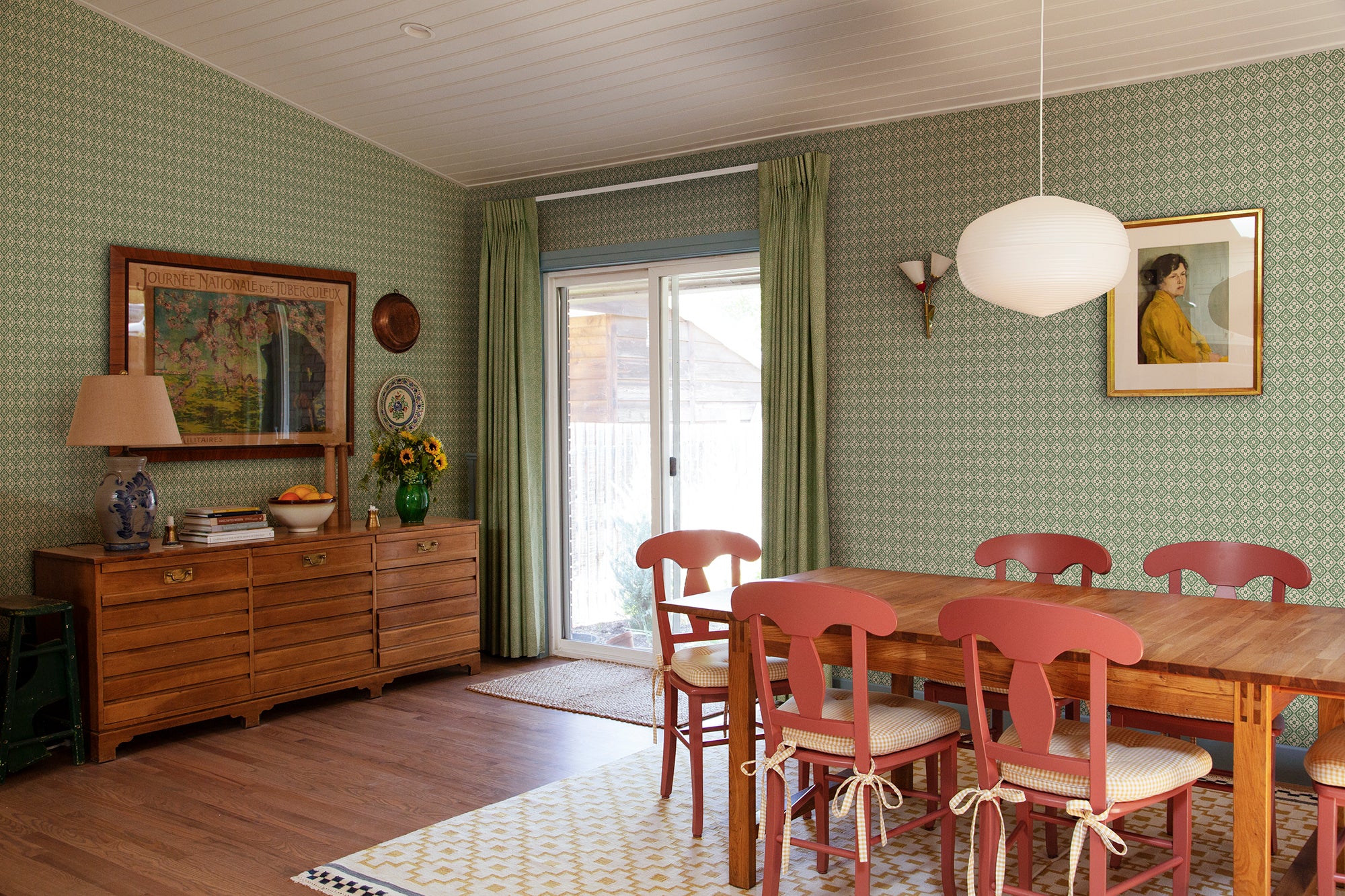 Lyckan wallpaper by Sandberg in Emerald, styled on an interior wall