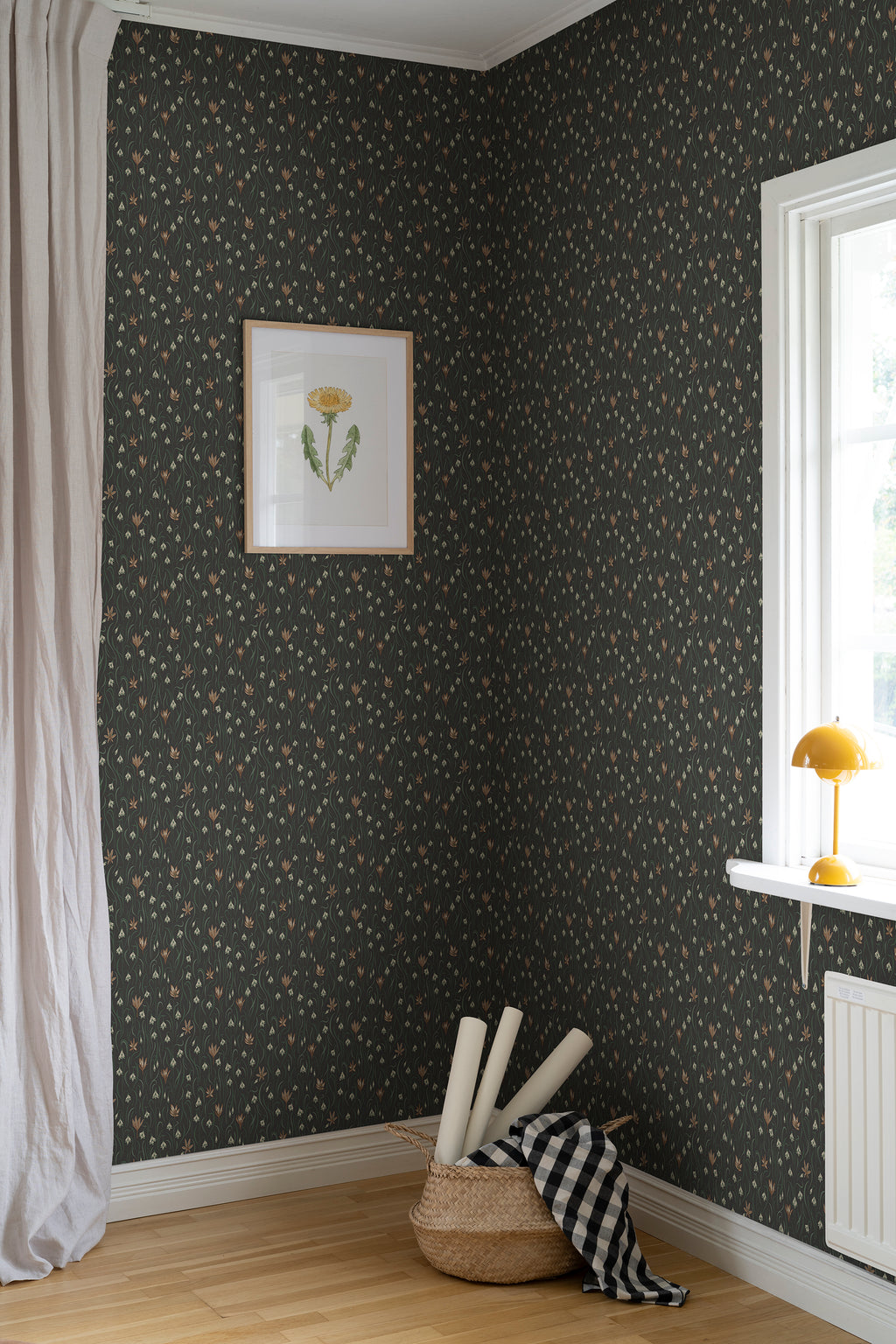 Signe wallpaper by Sandberg in Charcoal, styled on an interior wall