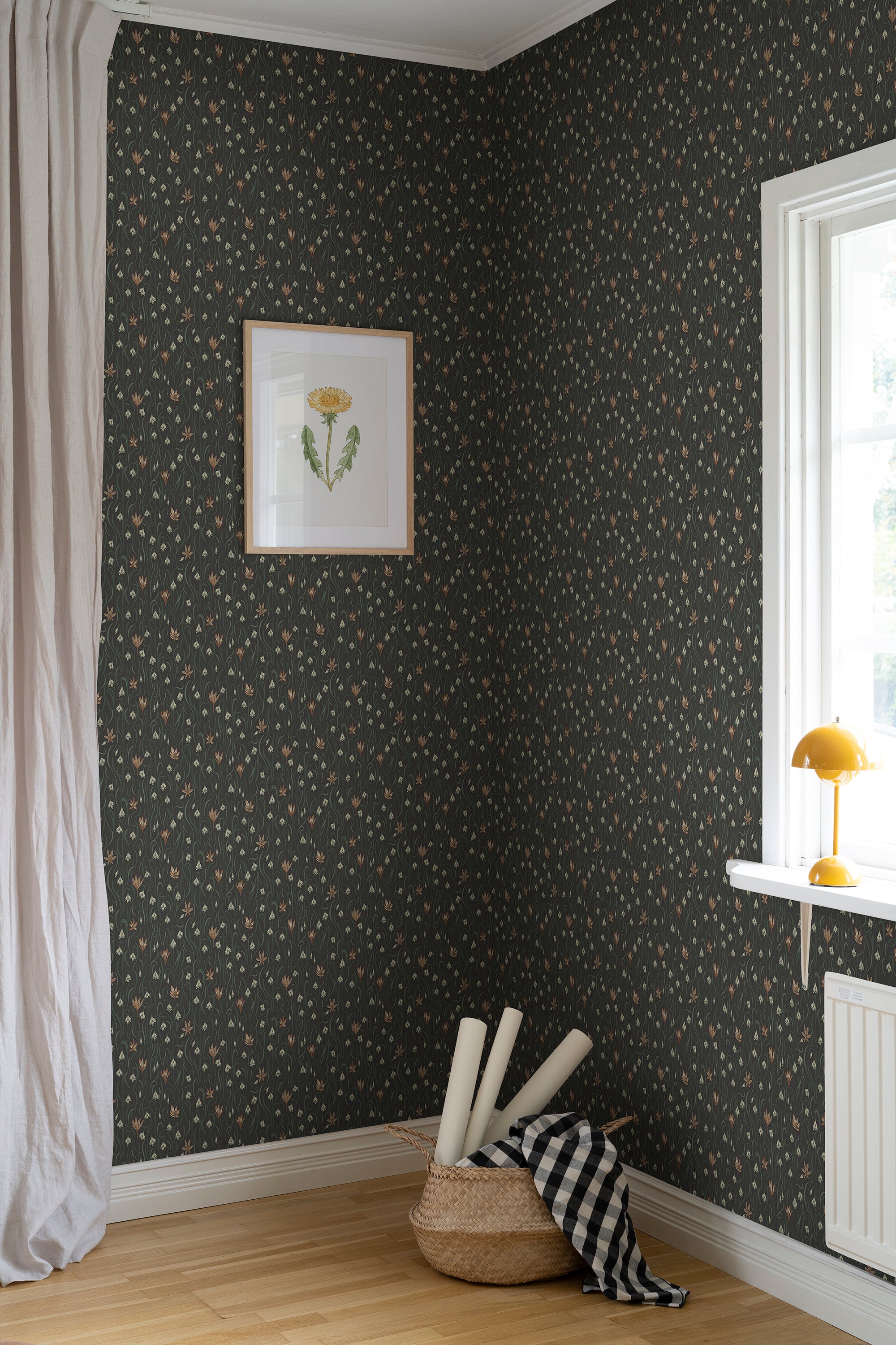 Signe wallpaper by Sandberg in Charcoal, styled on an interior wall