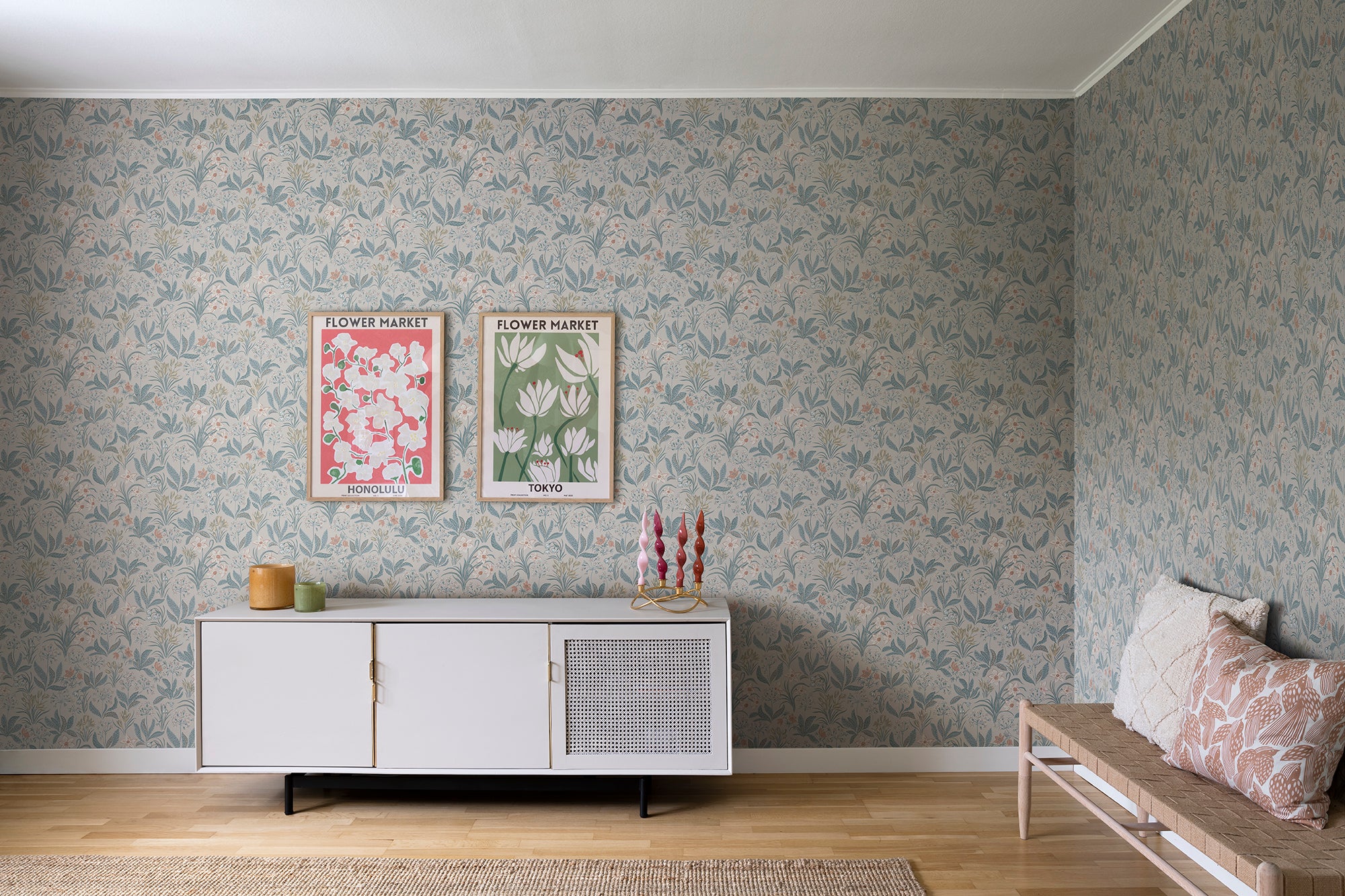 Huset i Solen wallpaper by Sandberg in Folklore Blue, styled on an interior wall