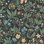 Huset i Solen wallpaper by Sandberg, flat swatch of a spring meadow of crocus, daffodils and snowdrops in green and gold on near-black
