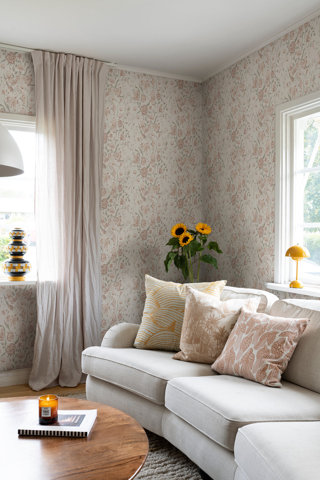 Karins Bukett wallpaper by Sandberg in Powder Pink, styled on an interior wall