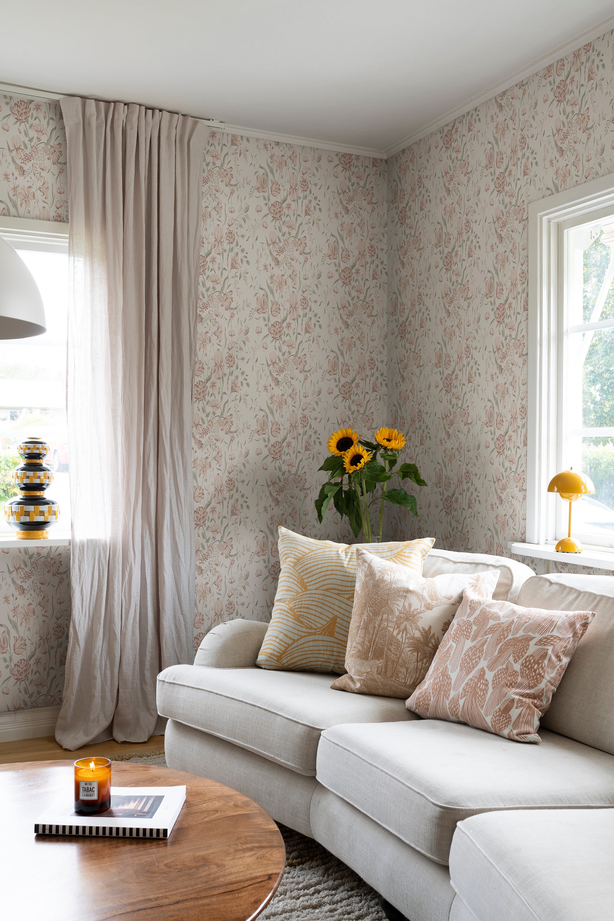 Karins Bukett wallpaper by Sandberg in Powder Pink, styled on an interior wall