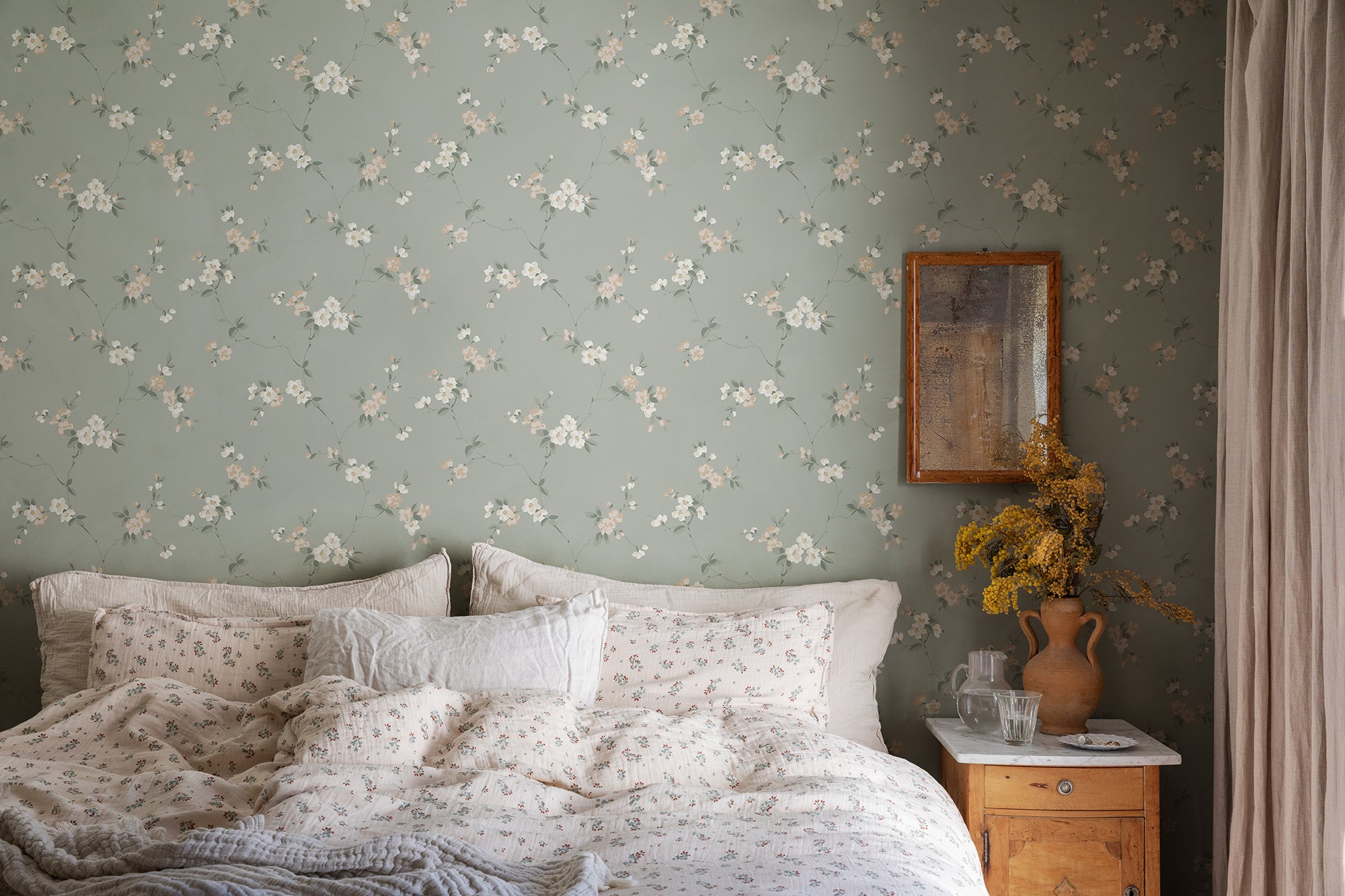 Engla wallpaper by Sandberg in Sage Green, styled on an interior wall