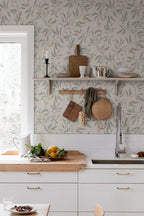 Vinnie wallpaper by Sandberg in Sage Green, styled on an interior wall
