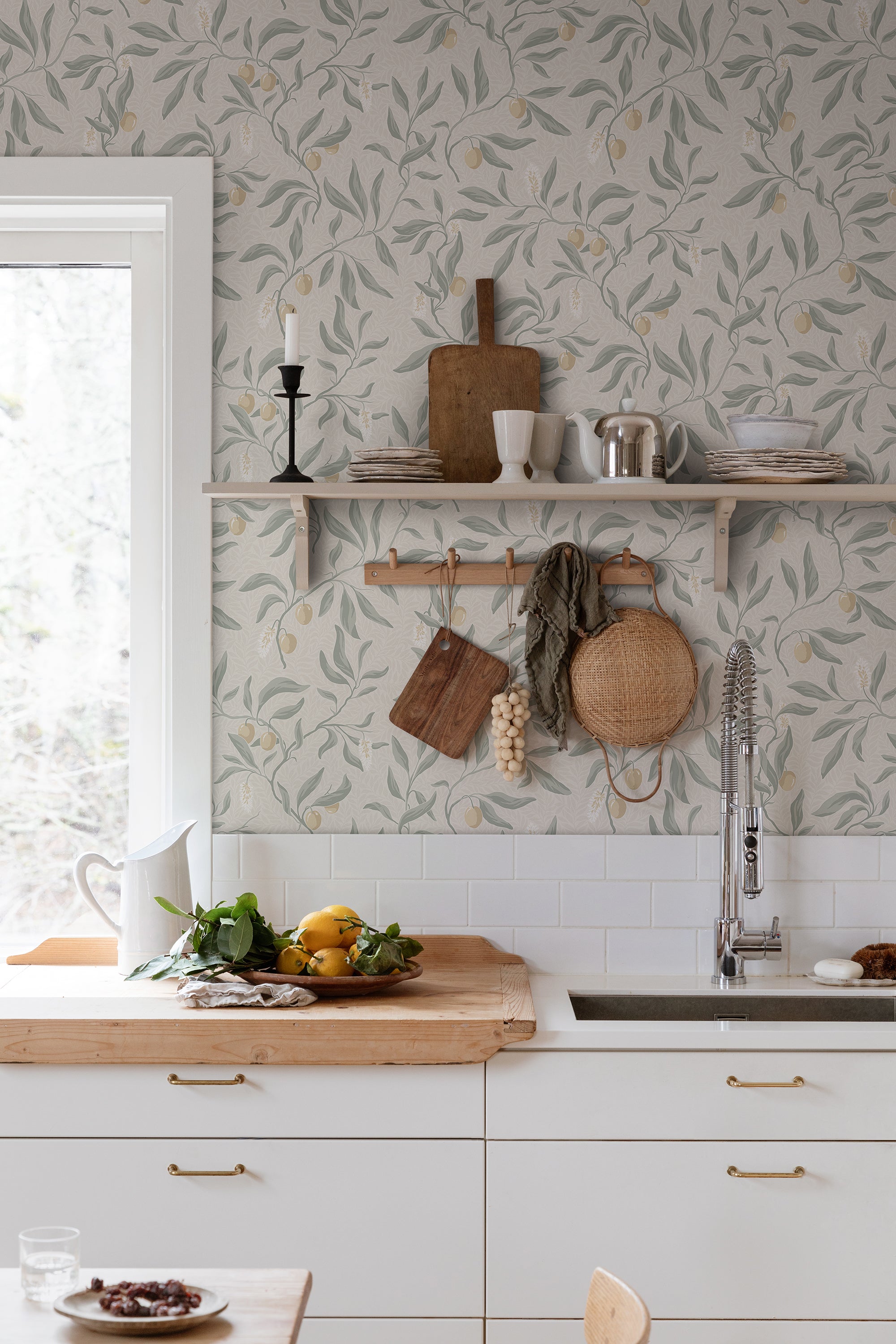 Vinnie wallpaper by Sandberg in Sage Green, styled on an interior wall