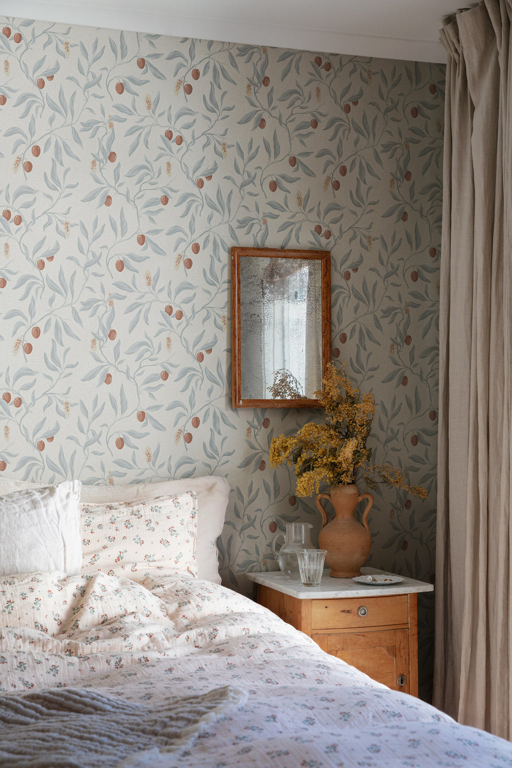 Vinnie wallpaper by Sandberg in Misty Blue, styled on an interior wall