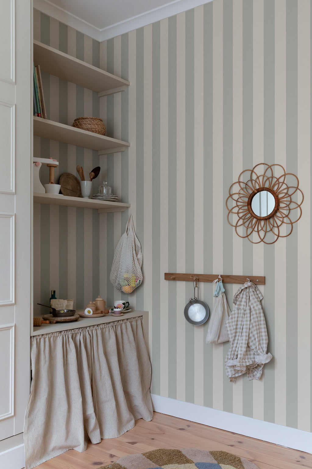 Sam wallpaper by Sandberg in Sage Green, styled on an interior wall
