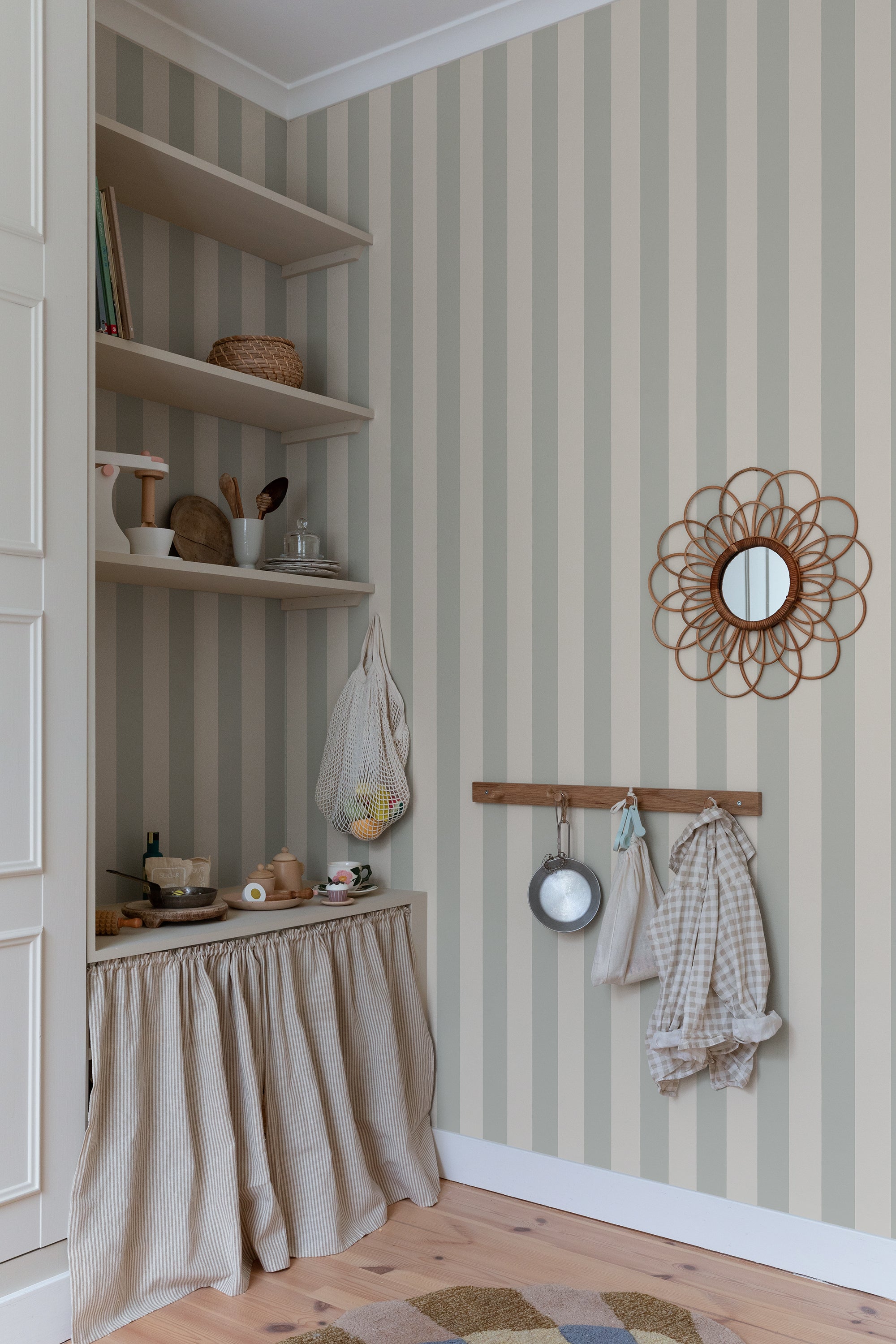 Sam wallpaper by Sandberg in Sage Green, styled on an interior wall