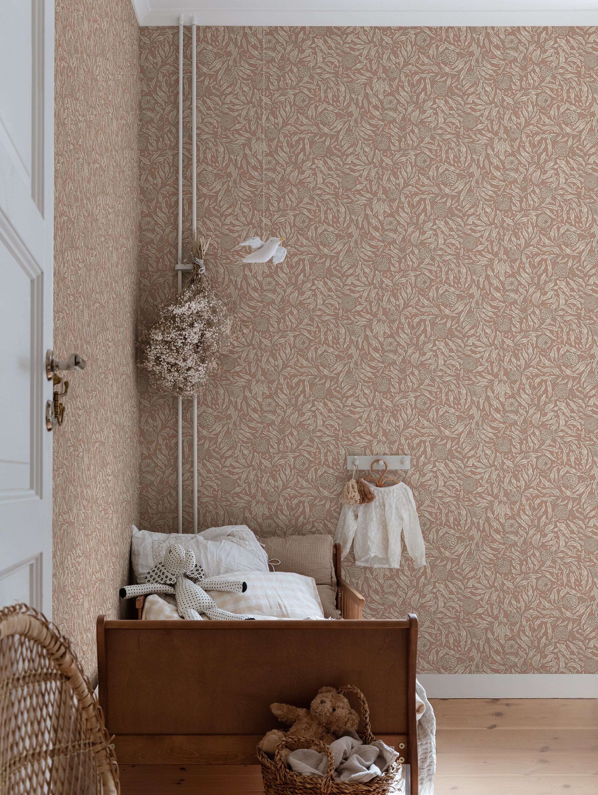 Olof wallpaper by Sandberg in Terracotta, styled on an interior wall