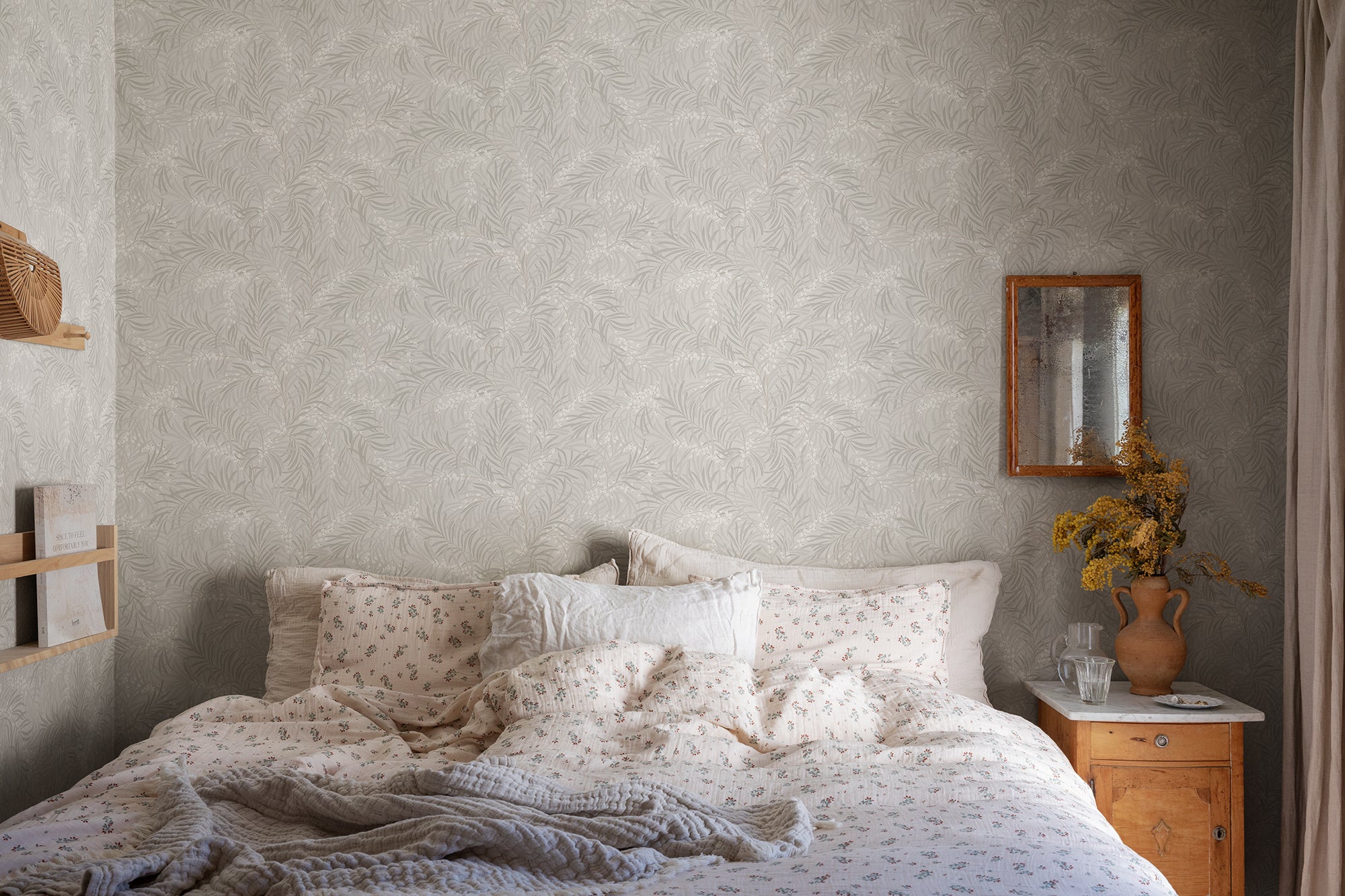 Idun wallpaper by Sandberg in Mineral Gray, styled on an interior wall