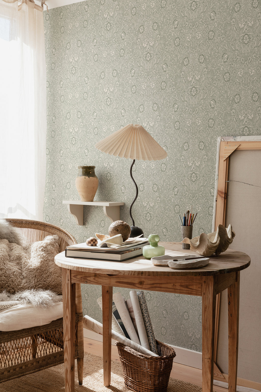 Caroline wallpaper by Sandberg in Moss Green, styled on an interior wall