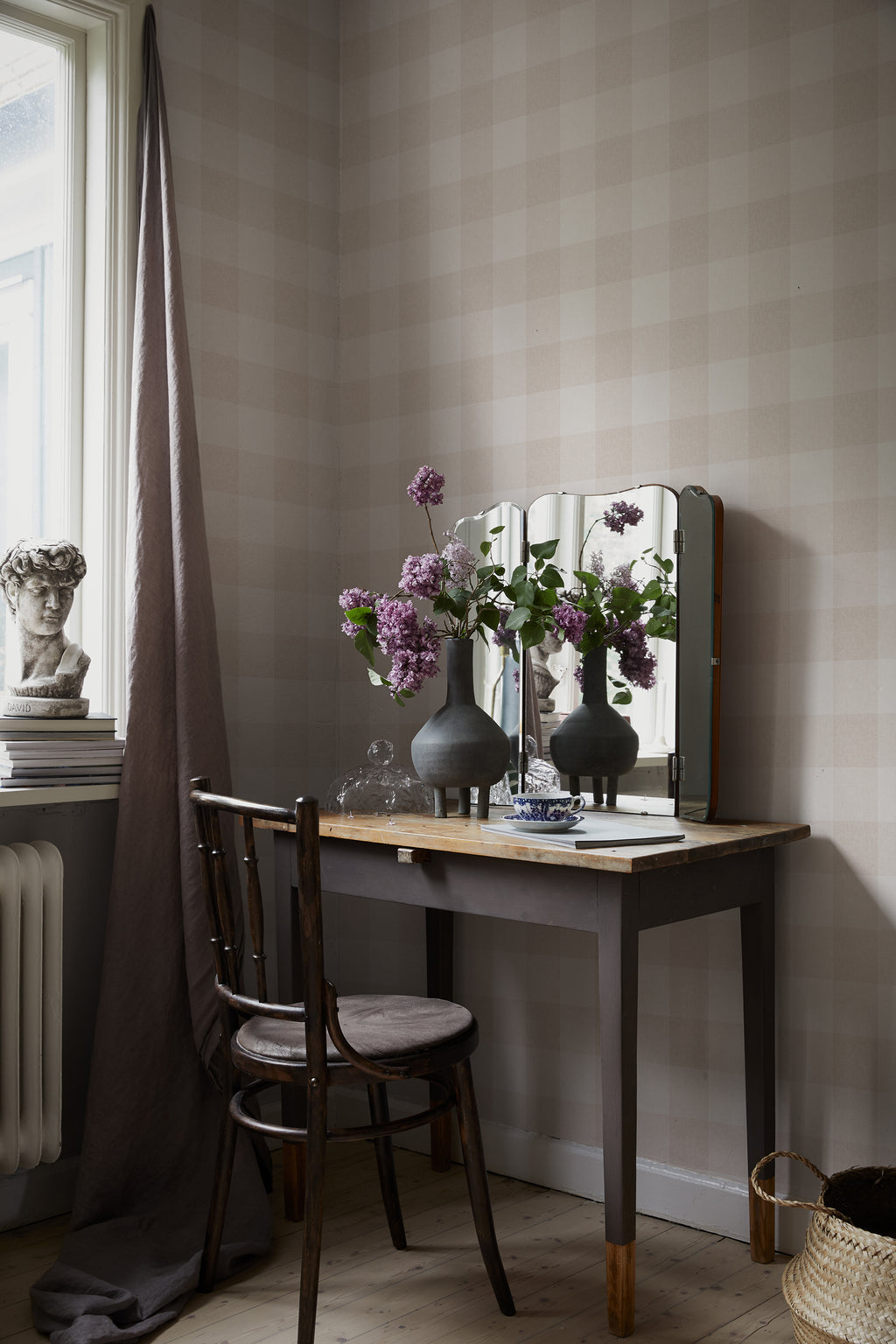 Lykke wallpaper by Sandberg in Sandstone, styled on an interior wall