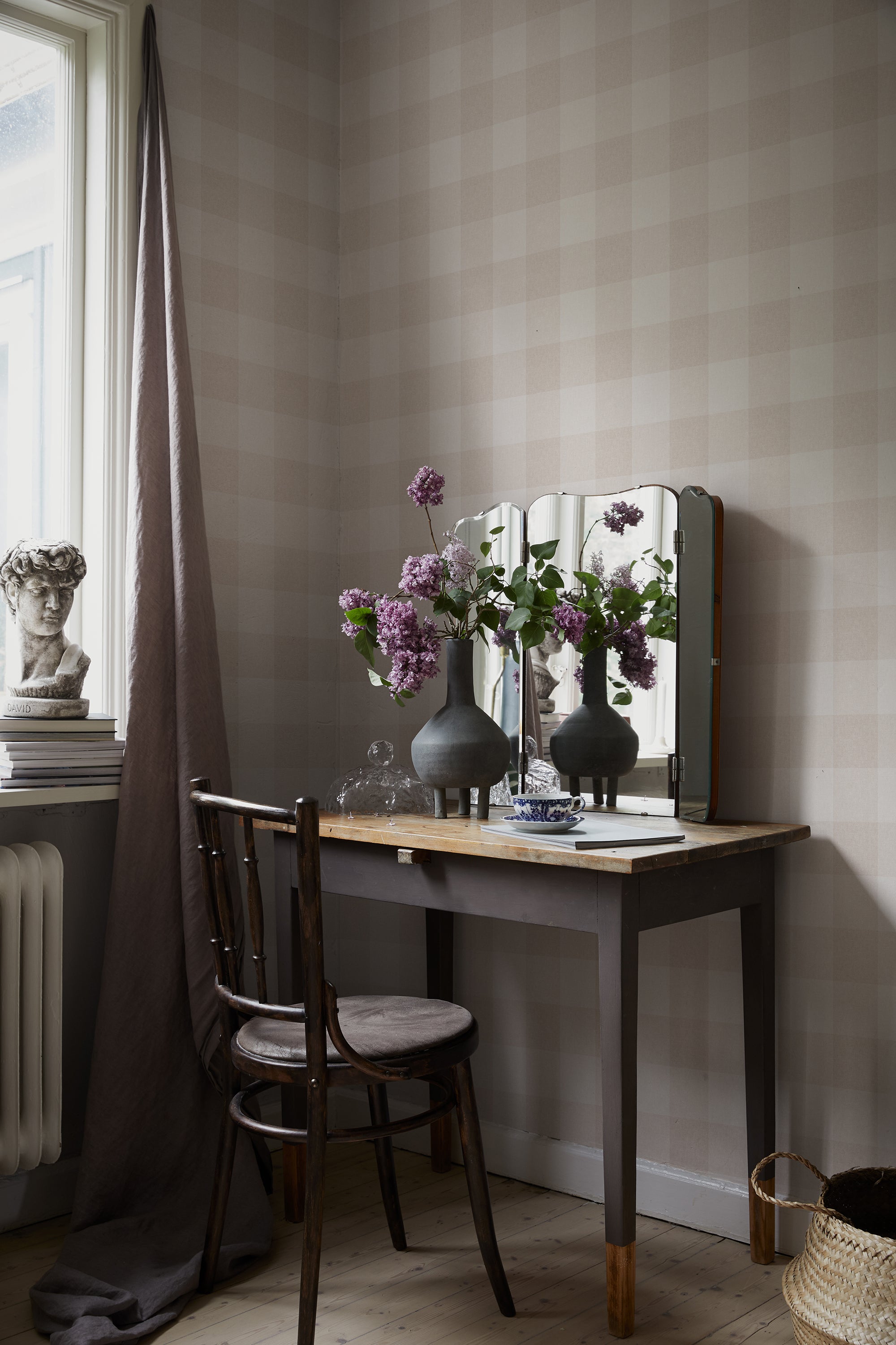 Lykke wallpaper by Sandberg in Sandstone, styled on an interior wall