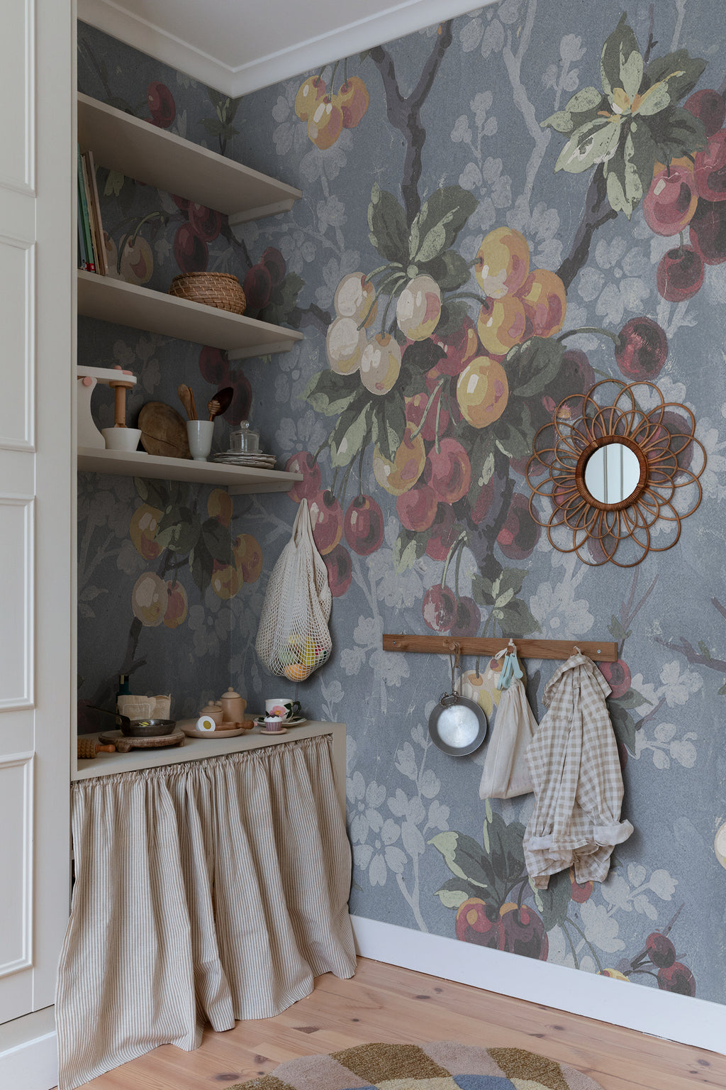 Franka wall mural by Sandberg in Sky Blue, styled on an interior wall