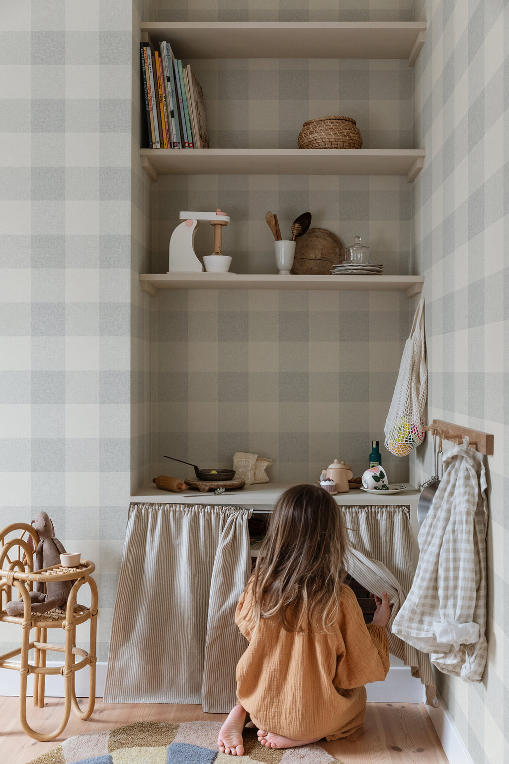 Lykke wallpaper by Sandberg in Misty Blue, styled on an interior wall