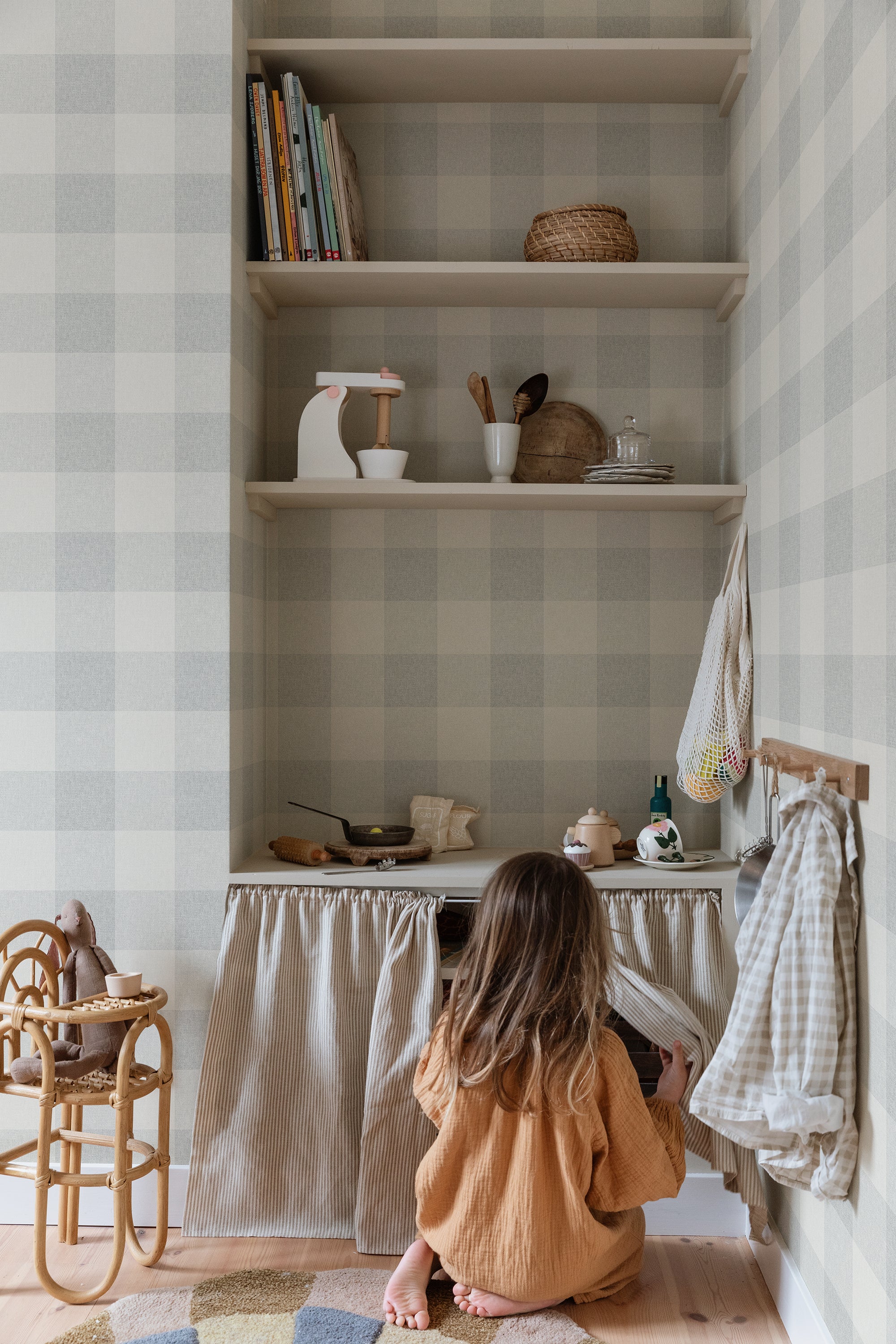 Lykke wallpaper by Sandberg in Misty Blue, styled on an interior wall