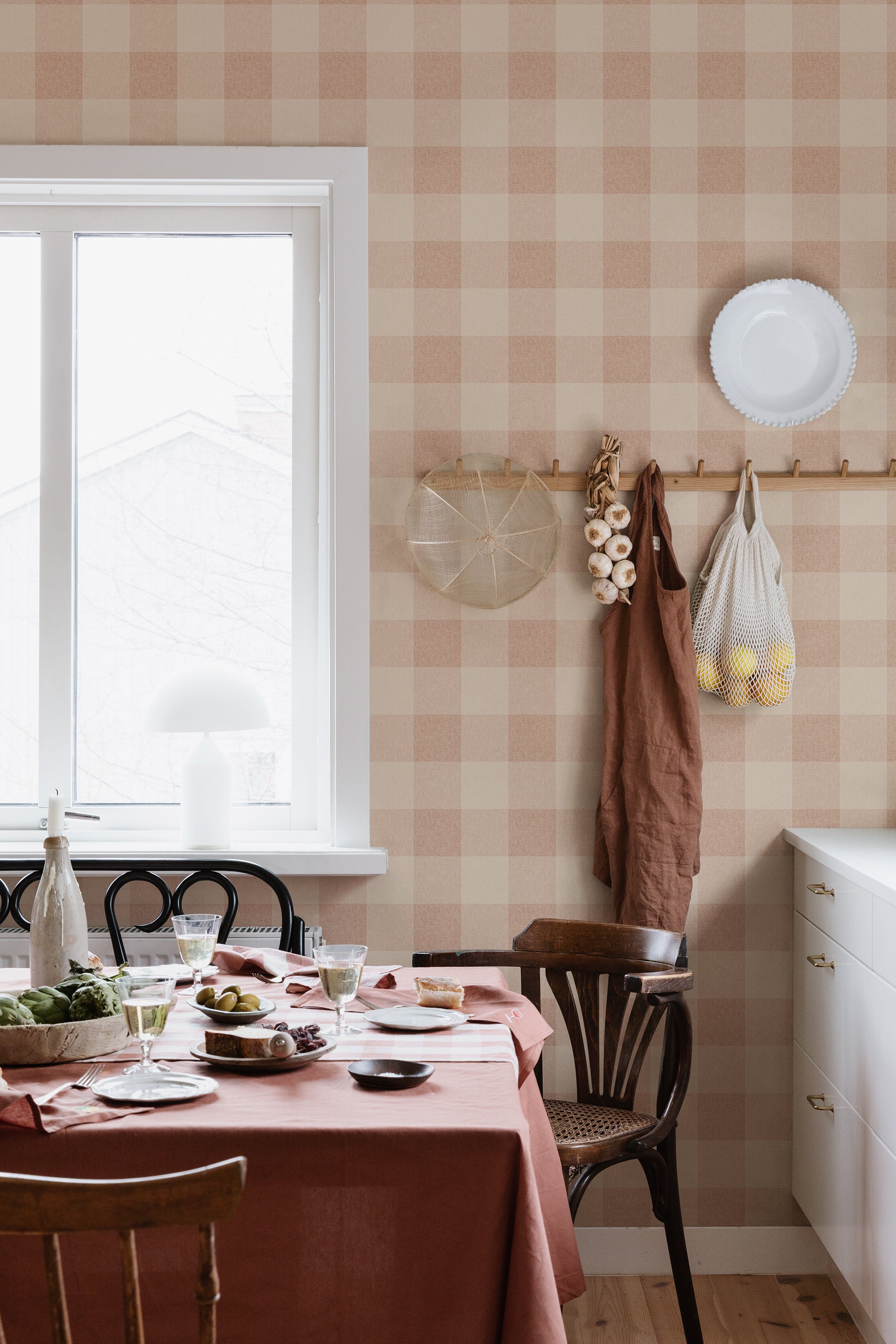 Lykke wallpaper by Sandberg in Terracotta, styled on an interior wall