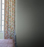 Beata wallpaper by Sandberg in Moss Green, styled on an interior wall
