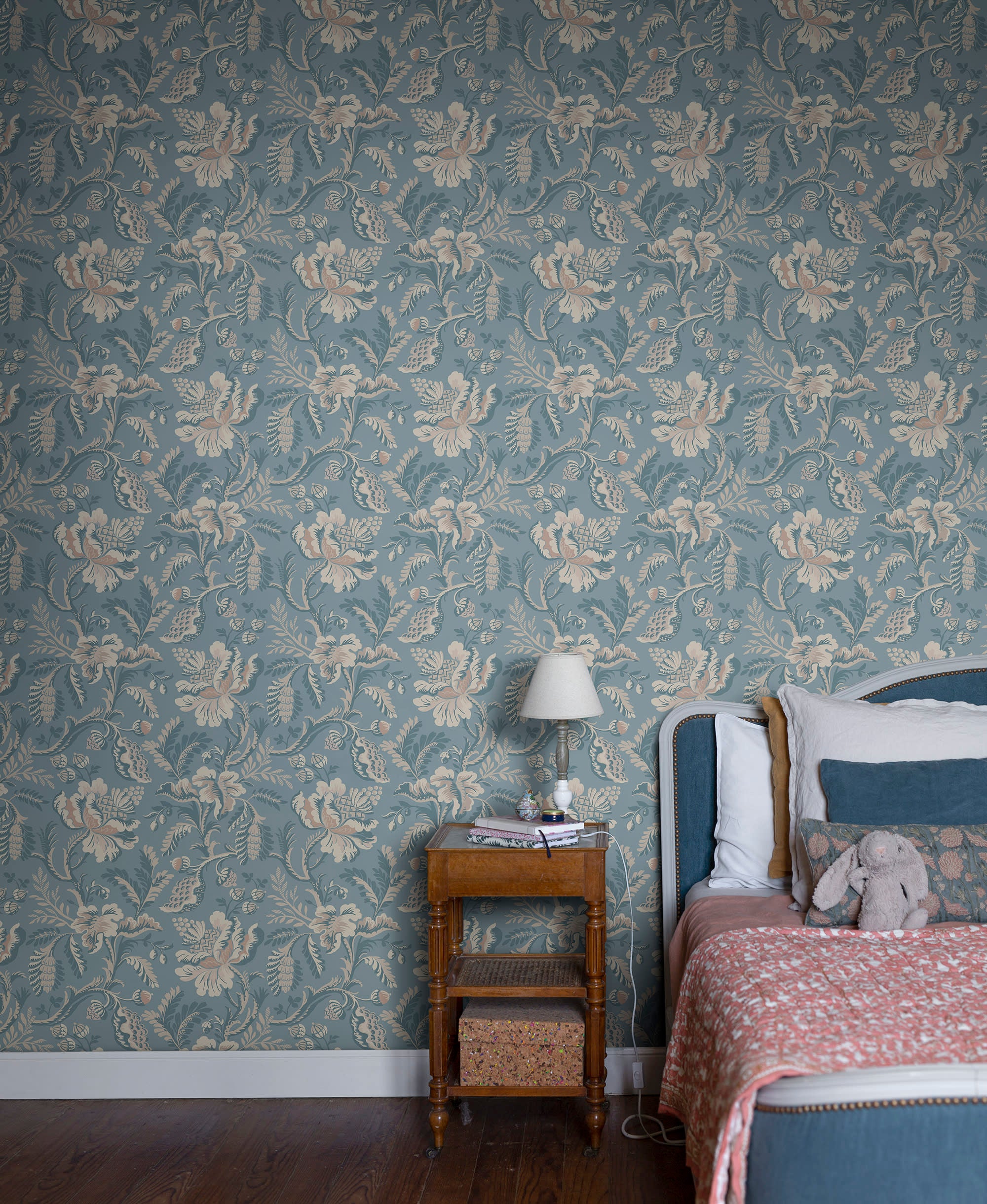 Daphne wallpaper by Sandberg in Misty Blue, styled on an interior wall