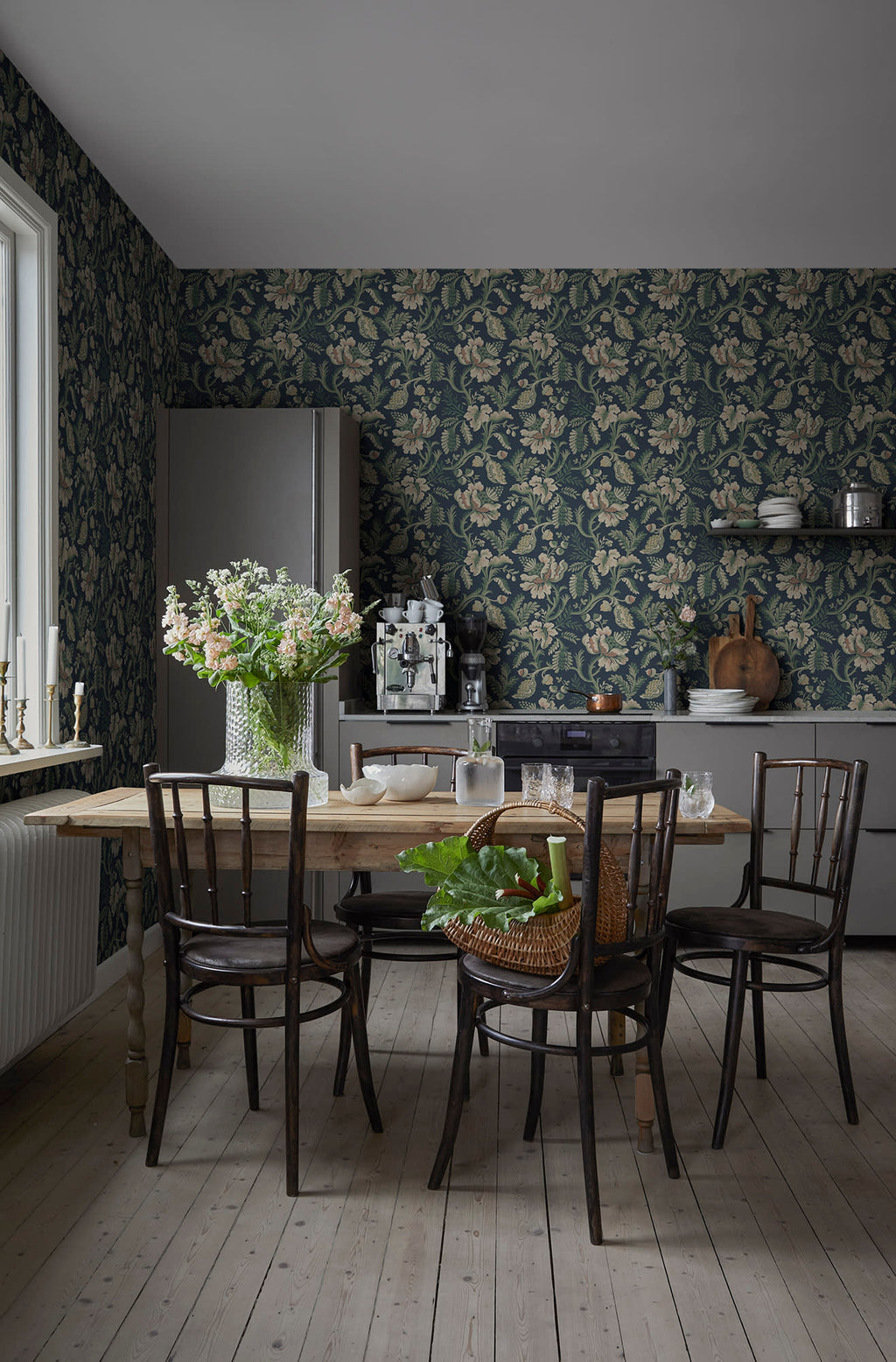 Daphne wallpaper by Sandberg in navy in a dining room with bentwood chairs and a pine table