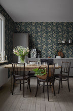 Daphne wallpaper by Sandberg in navy in a dining room with bentwood chairs and a pine table