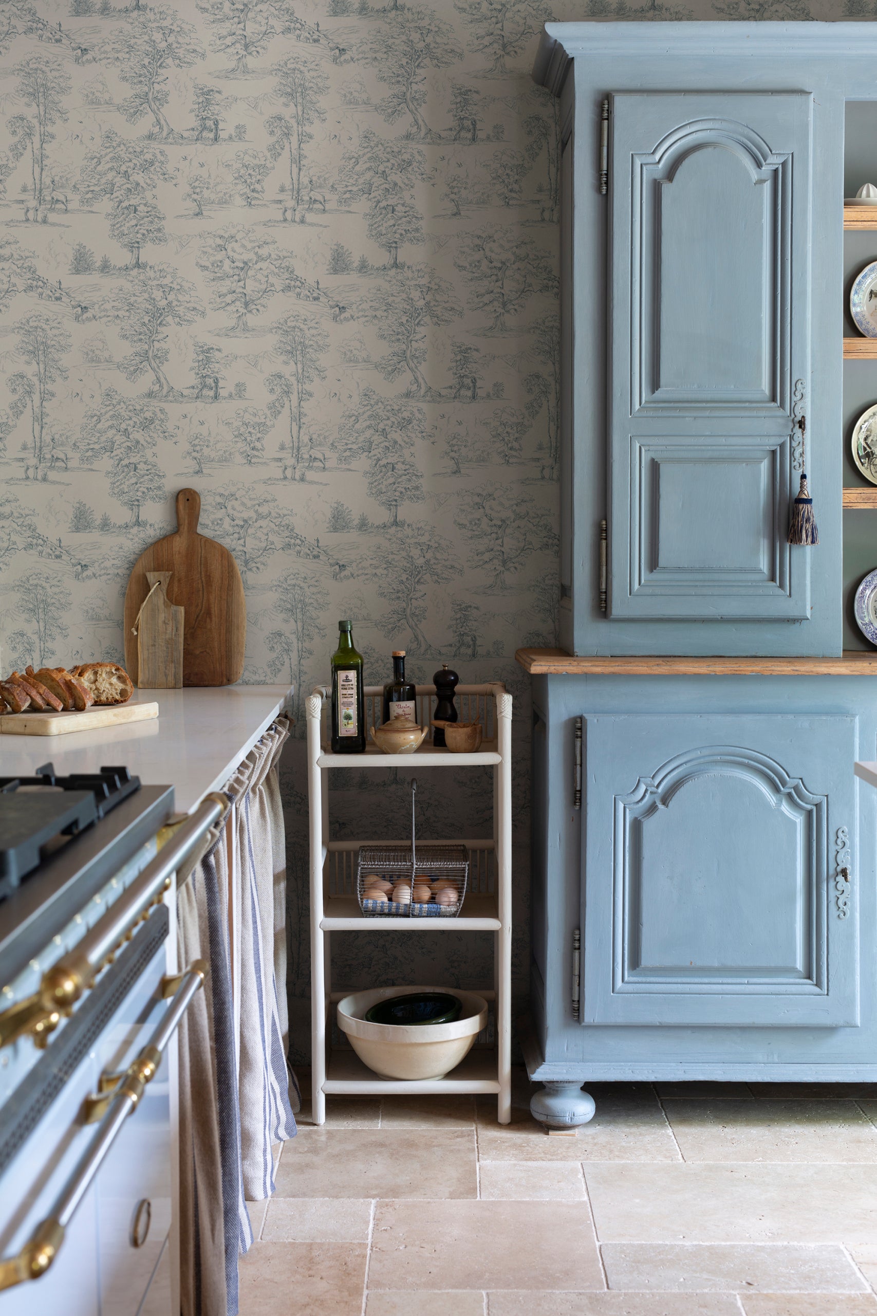 Montfort wallpaper by Sandberg in Indigo Blue, styled on an interior wall