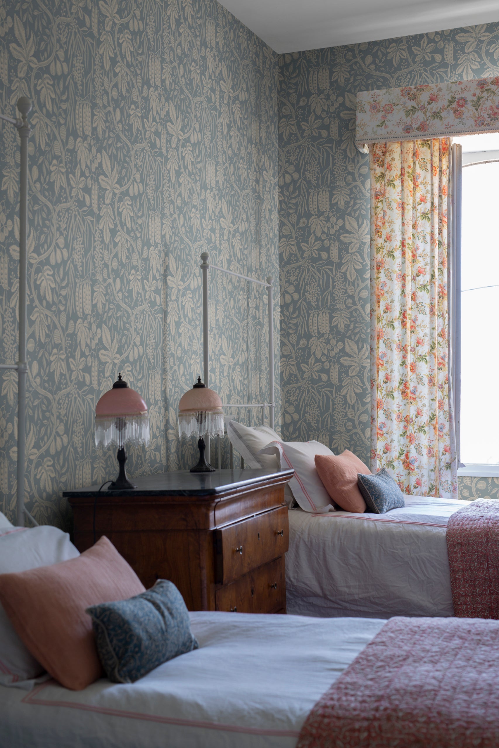 Fig Garden wallpaper by Sandberg in Misty Blue, styled on an interior wall