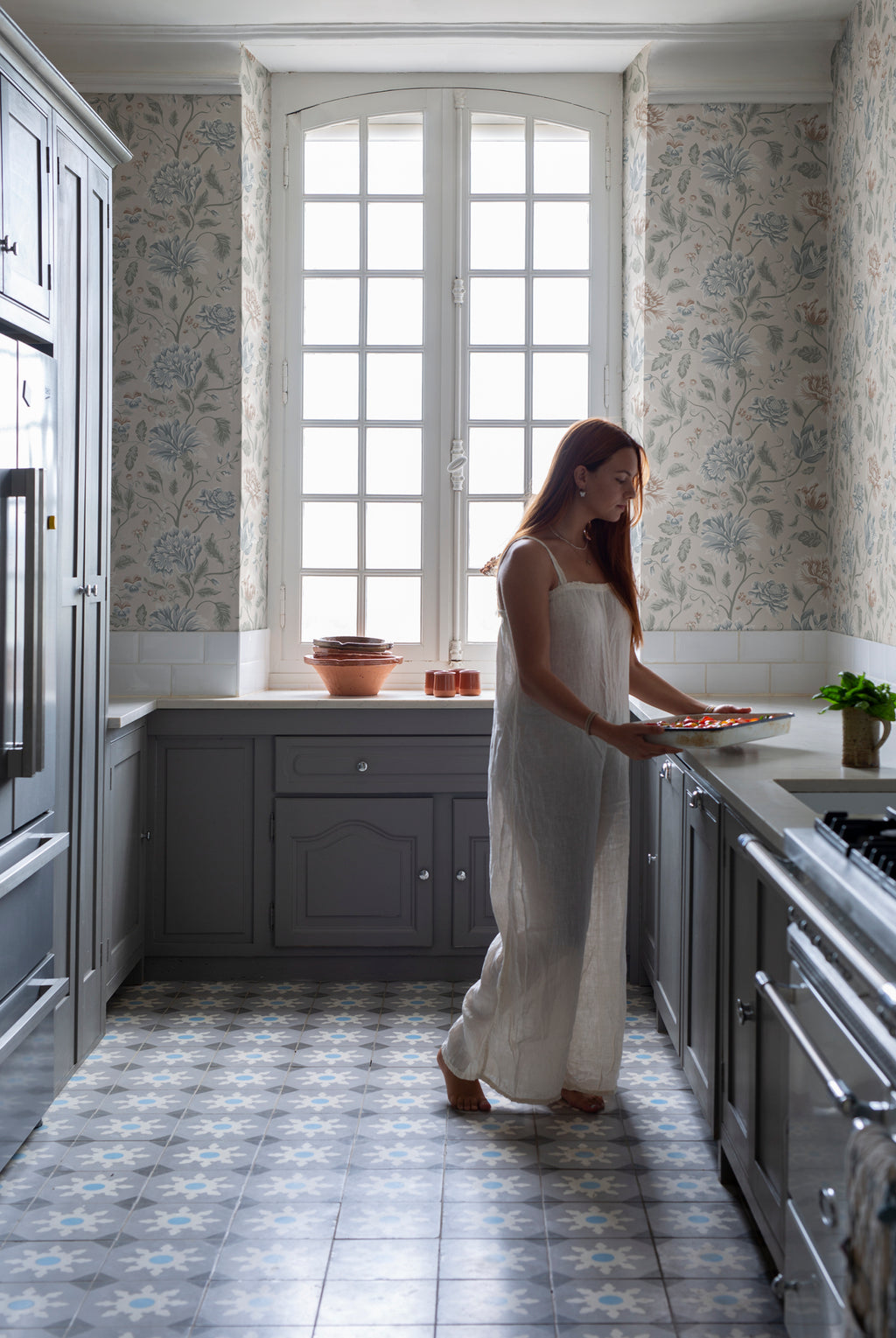 Annabelle wallpaper by Sandberg in Clay, styled on an interior wall