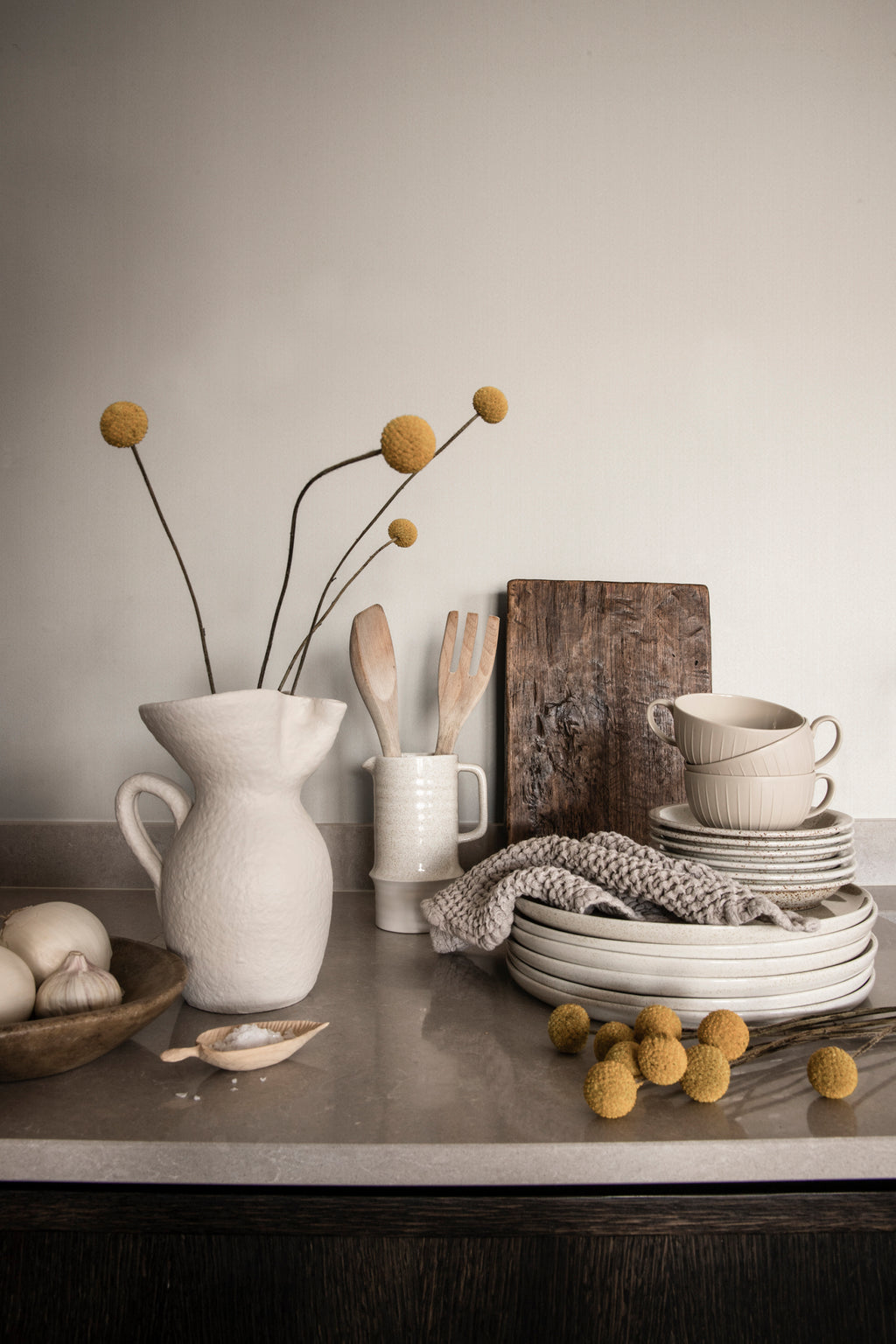 Linne wallpaper by Sandberg in White, styled on an interior wall